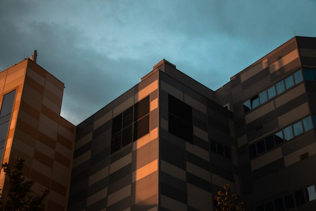 View on the office building flooded with evening spring warm sun