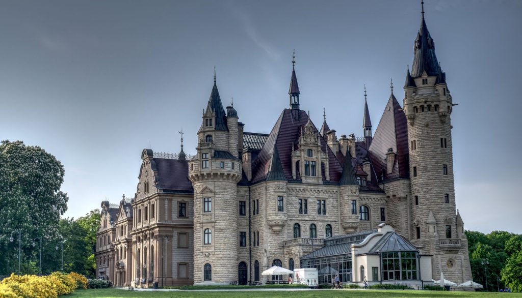 Explore the historic Moszna Castle in Poland, showcasing stunning romantic architecture.